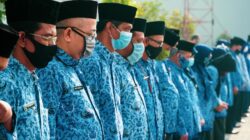 Ilustrasi revisi undang‑undang terbaru dengan dokumen hukum dan pena, menggambarkan perubahan regulasi.