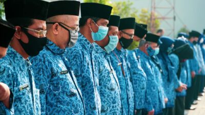 Ilustrasi revisi undang‑undang terbaru dengan dokumen hukum dan pena, menggambarkan perubahan regulasi.